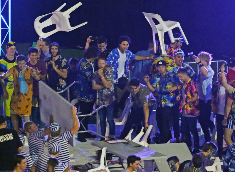 Illustration for article titled Rioting Costumed Fans Halt Australian Darts Competition